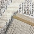 Denna produkten heter Piston Lyre, tillverkad av Polyester material med en vacker Beige färg - SE Mattor