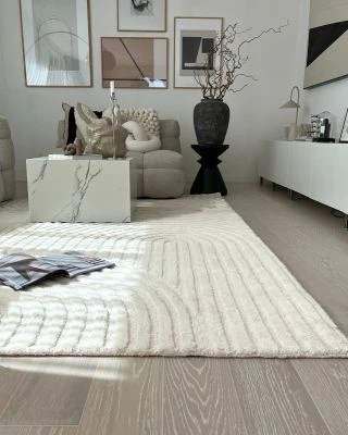 Denna produkten heter Ilona Bene, tillverkad av Ull material med en vacker Offwhite färg - SE Mattor