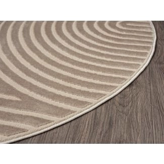 Denna produkten heter Bella Zen, tillverkad av Polyester & Polypropylen material med en vacker Mörkbeige färg - SE Mattor