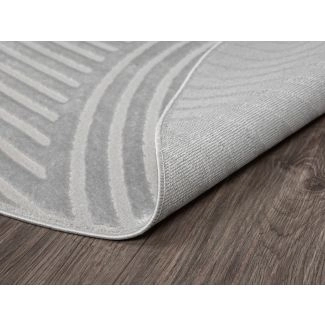 Denna produkten heter Bella Zen, tillverkad av Polyester & Polypropylen material med en vacker Grå färg - SE Mattor