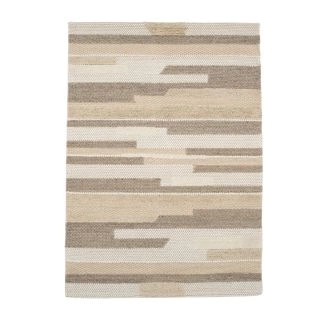Denna produkten heter Vintera, tillverkad av Ull material med en vacker Beige färg - SE Mattor