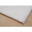 Denna produkten heter Fluffy, tillverkad av Polyester material med en vacker Offwhite färg - SE Mattor
