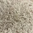 Denna produkten heter Julie, tillverkad av Polyester material med en vacker Beige färg - SE Mattor