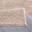 Denna produkten heter Lazy, tillverkad av Polypropylen material med en vacker Sand färg - SE Mattor