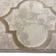 Denna produkten heter Menlo Enkido, tillverkad av Polyester material med en vacker Beige färg - SE Mattor