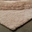 Denna produkten heter Moody Bow, tillverkad av Polyester material med en vacker Beige färg - SE Mattor