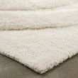 Denna produkten heter Moody Bow, tillverkad av Polyester material med en vacker Vit färg - SE Mattor