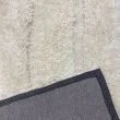 Denna produkten heter Moody Bow, tillverkad av Polyester material med en vacker Vit färg - SE Mattor
