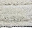 Denna produkten heter Moody Bow, tillverkad av Polyester material med en vacker Vit färg - SE Mattor