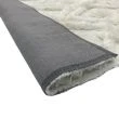 Denna produkten heter Moody Klay, tillverkad av Polyester material med en vacker Vit färg - SE Mattor