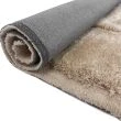 Denna produkten heter Moody Logic, tillverkad av Polyester material med en vacker Beige färg - SE Mattor