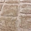 Denna produkten heter Moody Logic, tillverkad av Polyester material med en vacker Beige färg - SE Mattor