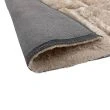Denna produkten heter Moody Logic, tillverkad av Polyester material med en vacker Beige färg - SE Mattor