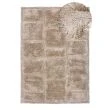 Denna produkten heter Moody Logic, tillverkad av Polyester material med en vacker Beige färg - SE Mattor