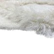 Denna produkten heter Moody Flo, tillverkad av Polyester material med en vacker Vit färg - SE Mattor
