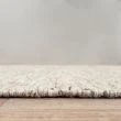 Denna produkten heter Norrsken, tillverkad av 60% Ull & 40% Bomull material med en vacker Taupe färg - SE Mattor