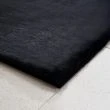 Denna produkten heter Rabbit Eco, tillverkad av Polyester material med en vacker Svart färg - SE Mattor