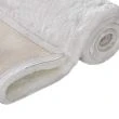 Denna produkten heter Rabbit Fur, tillverkad av Polyester material med en vacker Vit färg - SE Mattor