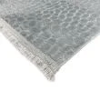 Denna produkten heter Reno Stone, tillverkad av Polyester material med en vacker Grå färg - SE Mattor