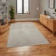 Denna produkten heter Reno Stone, tillverkad av Polyester material med en vacker Beige färg - SE Mattor