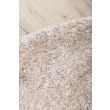 Denna produkten heter Ludvig, tillverkad av Polyester material med en vacker Beige färg - SE Mattor
