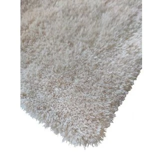 Denna produkten heter Midelt Beige 80x150 cm, tillverkad av Polyester material med en vacker Beige färg - SE Mattor