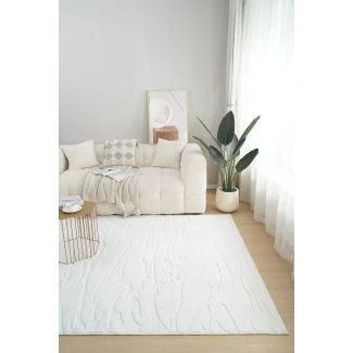 Denna produkten heter Rabbit Nest, tillverkad av Polyester material med en vacker Offwhite färg - SE Mattor