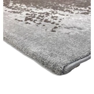 Denna produkten heter Thema Fiore, tillverkad av Polyester material med en vacker Grå färg - SE Mattor