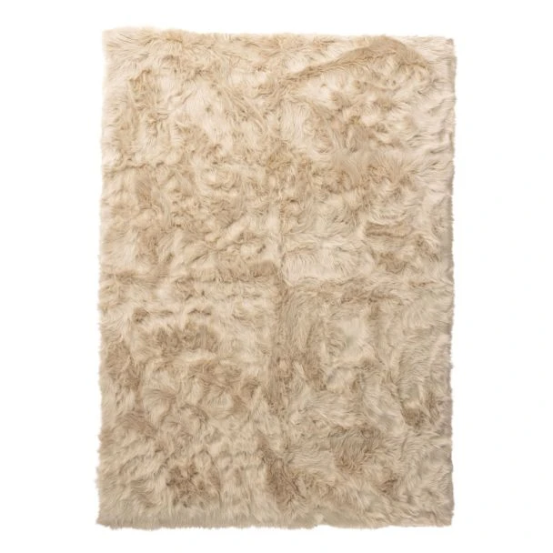 Denna produkten heter Ana, tillverkad av Akryl material med en vacker Beige färg - SE Mattor