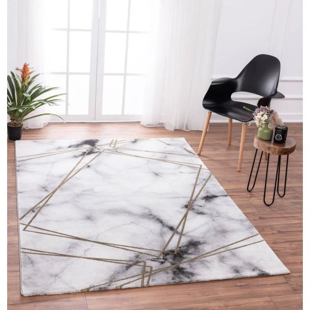 Denna produkten heter Craft Laser, tillverkad av Polyester & Polypropylen material med en vacker Guld färg - SE Mattor