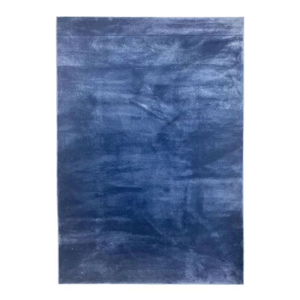 Denna produkten heter Luster, tillverkad av Polyester material med en vacker Blå färg - SE Mattor
