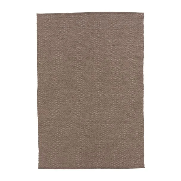 Denna produkten heter Floren, tillverkad av Ull material med en vacker Brun färg - SE Mattor