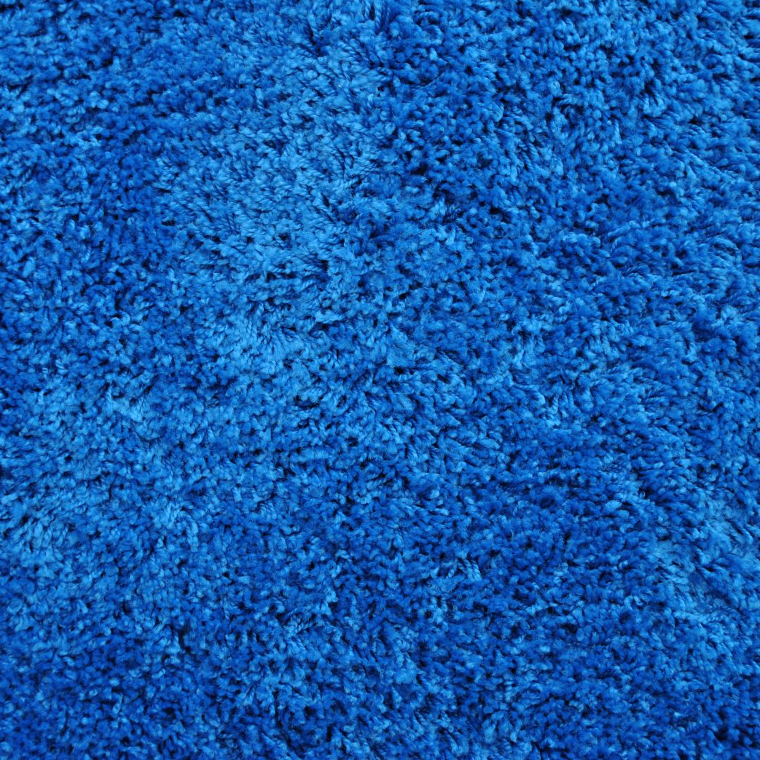 Närbild på blå matta i mjuk och bekväm textur som ger en lugn och fri sinnestillstånd.